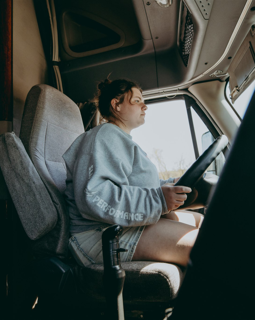 cdl student driver behind the wheel of tractor trailer