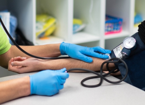 Student measures blood pressure