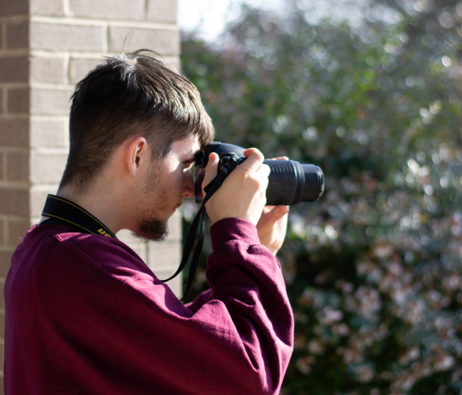 Student photographs bushes