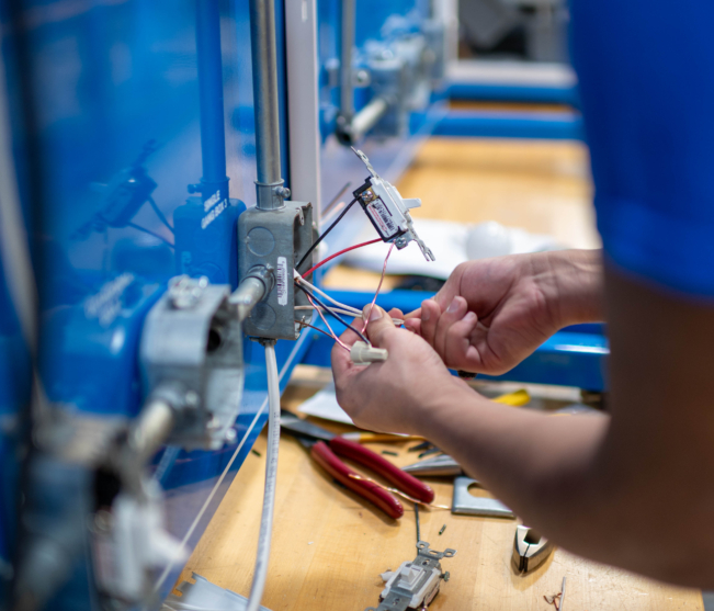 student works with wires